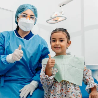Patient receiving dental care at Smile & Shine